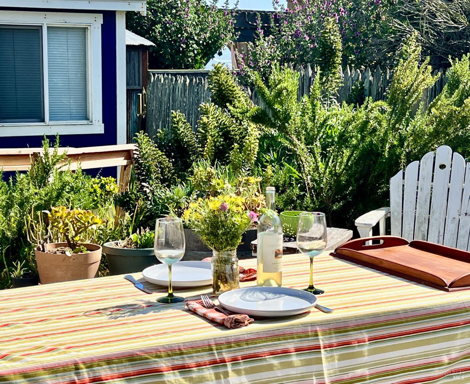 75 Ocean View Avenue Dillon Beach, CA 94929 - Photo 27 of 30 a view of a house with backyard and sitting area