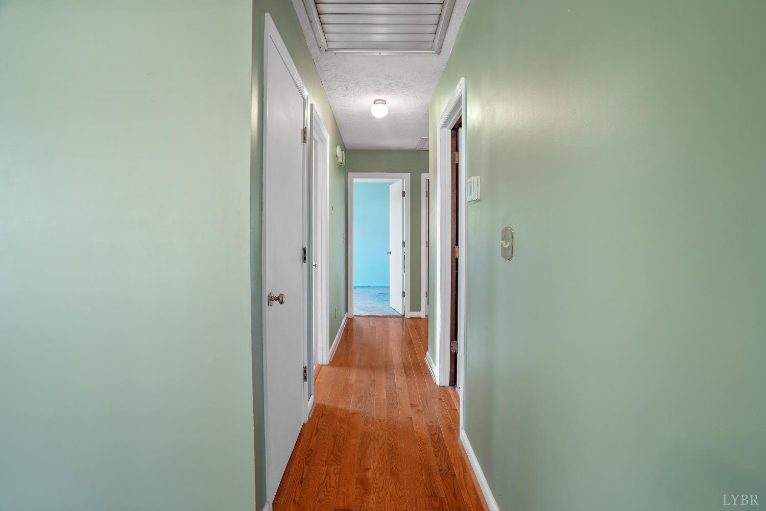 2294 High Peak Road Monroe, VA 24574 - Photo 20 of 53 a view of a hallway with a lamp