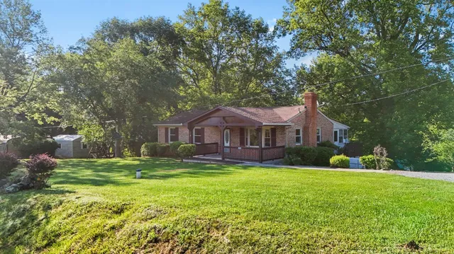 a view of a house with a garden
