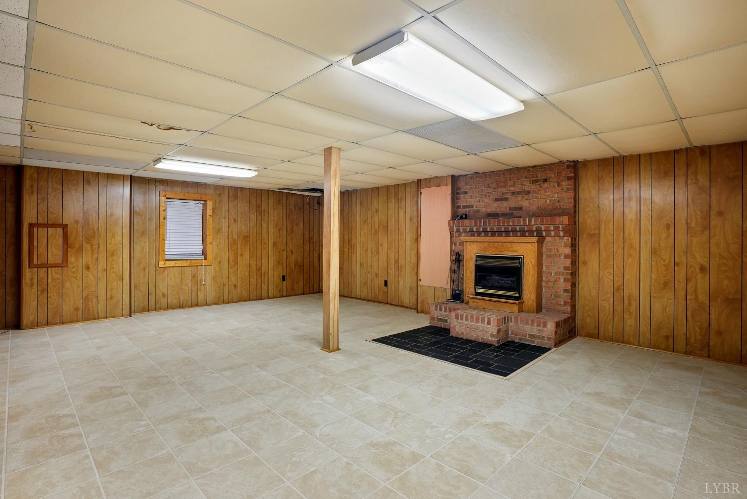 2294 High Peak Road Monroe, VA 24574 - Photo 28 of 53 a view of an empty room with a fireplace