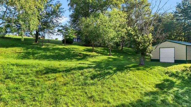 a view of an empty room with a balcony
