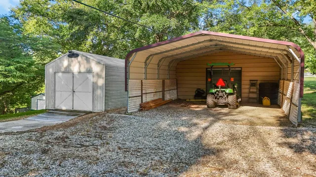 a backyard of a house with lots of green space