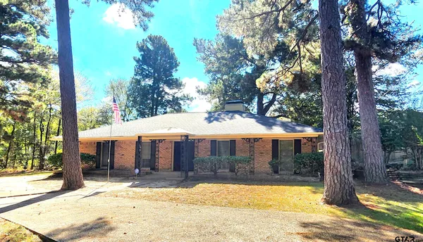 a view of a house with a swimming pool
