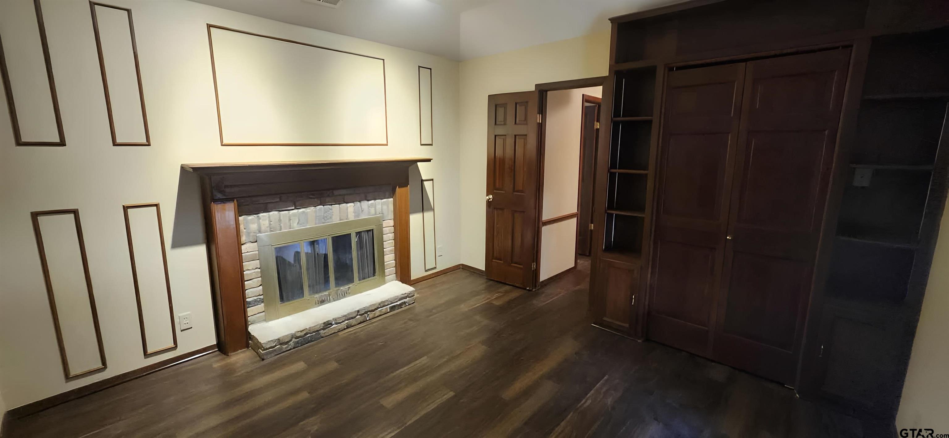 14141 County Road 1237 Tyler, TX 75703 - Photo 5 of 15 a view of a livingroom with a fireplace