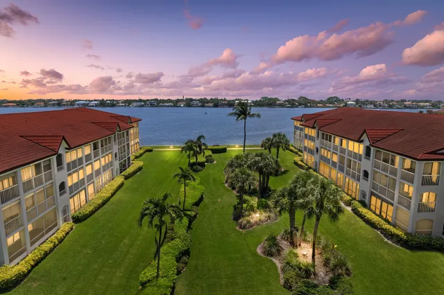 a view of a lake with a city in the background