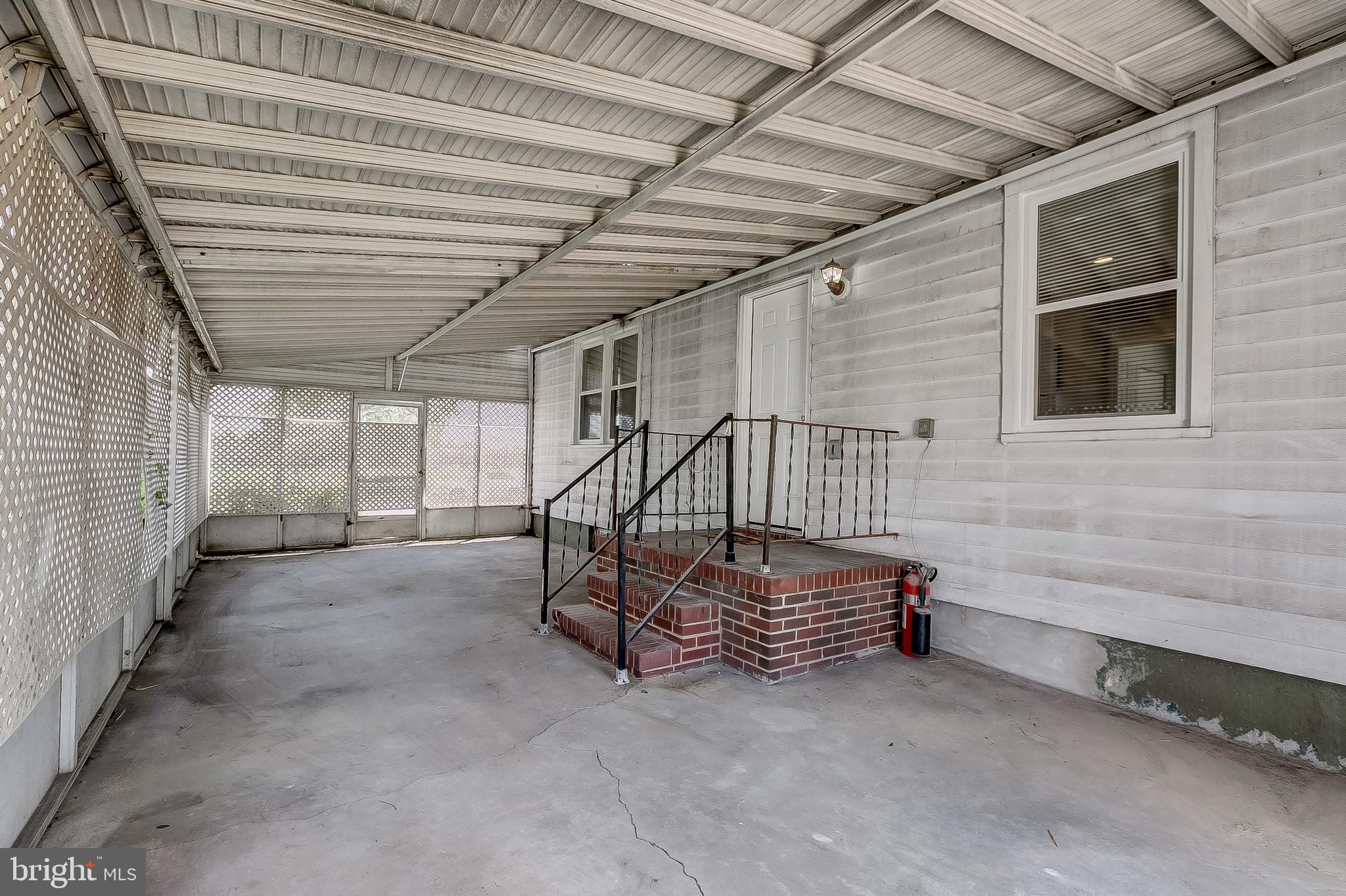 7622 Parkwood Road Baltimore, MD 21222 - Photo 22 of 32 Covered side patio