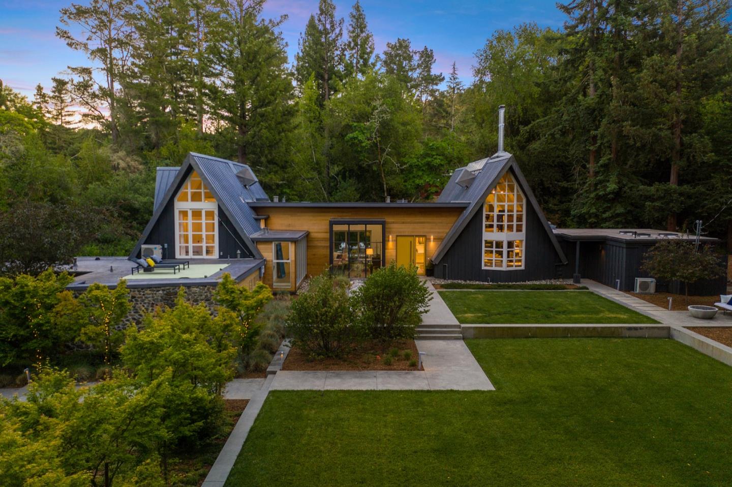 135 Willowbrook Drive Portola Valley, CA 94028 - Photo 1 of 50 a front view of a house with a yard