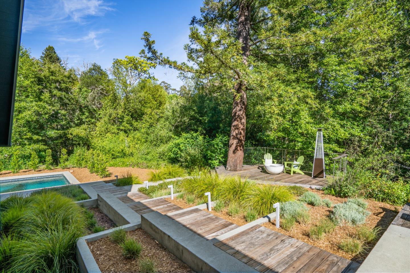 135 Willowbrook Drive Portola Valley, CA 94028 - Photo 21 of 50 a view of a yard with wooden fence