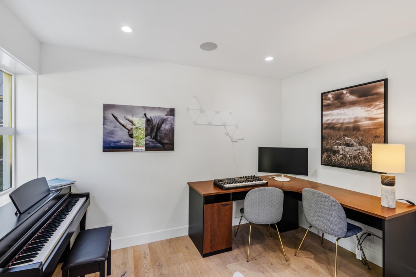 135 Willowbrook Drive Portola Valley, CA 94028 - Photo 31 of 50 a workspace with furniture and lamp