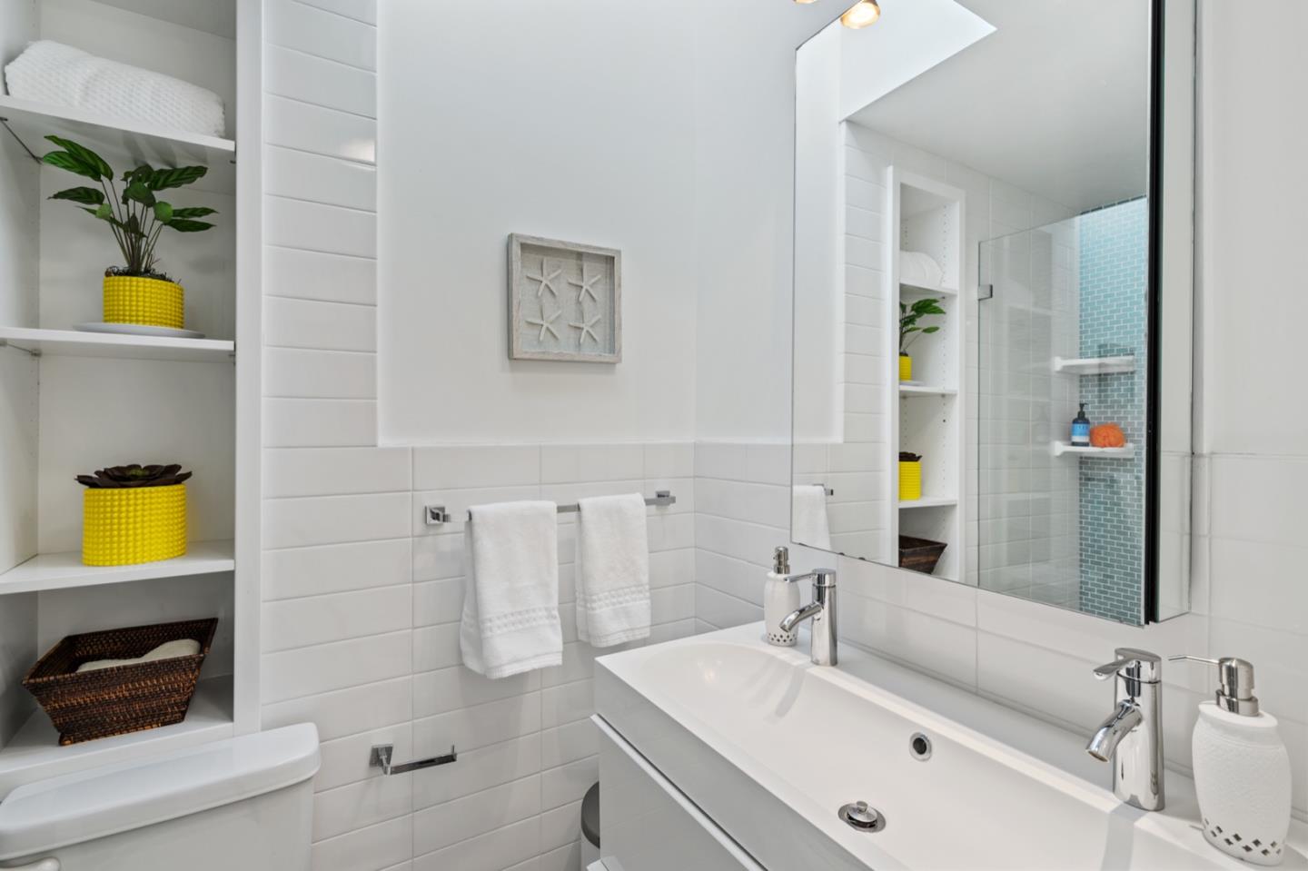 135 Willowbrook Drive Portola Valley, CA 94028 - Photo 35 of 50 a bathroom with a sink a bathtub and a mirror