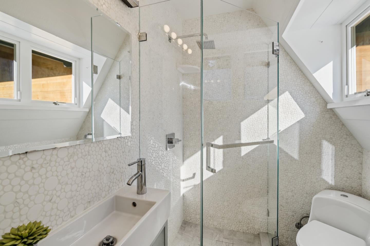 135 Willowbrook Drive Portola Valley, CA 94028 - Photo 39 of 50 a bathroom with a bathtub and a shower