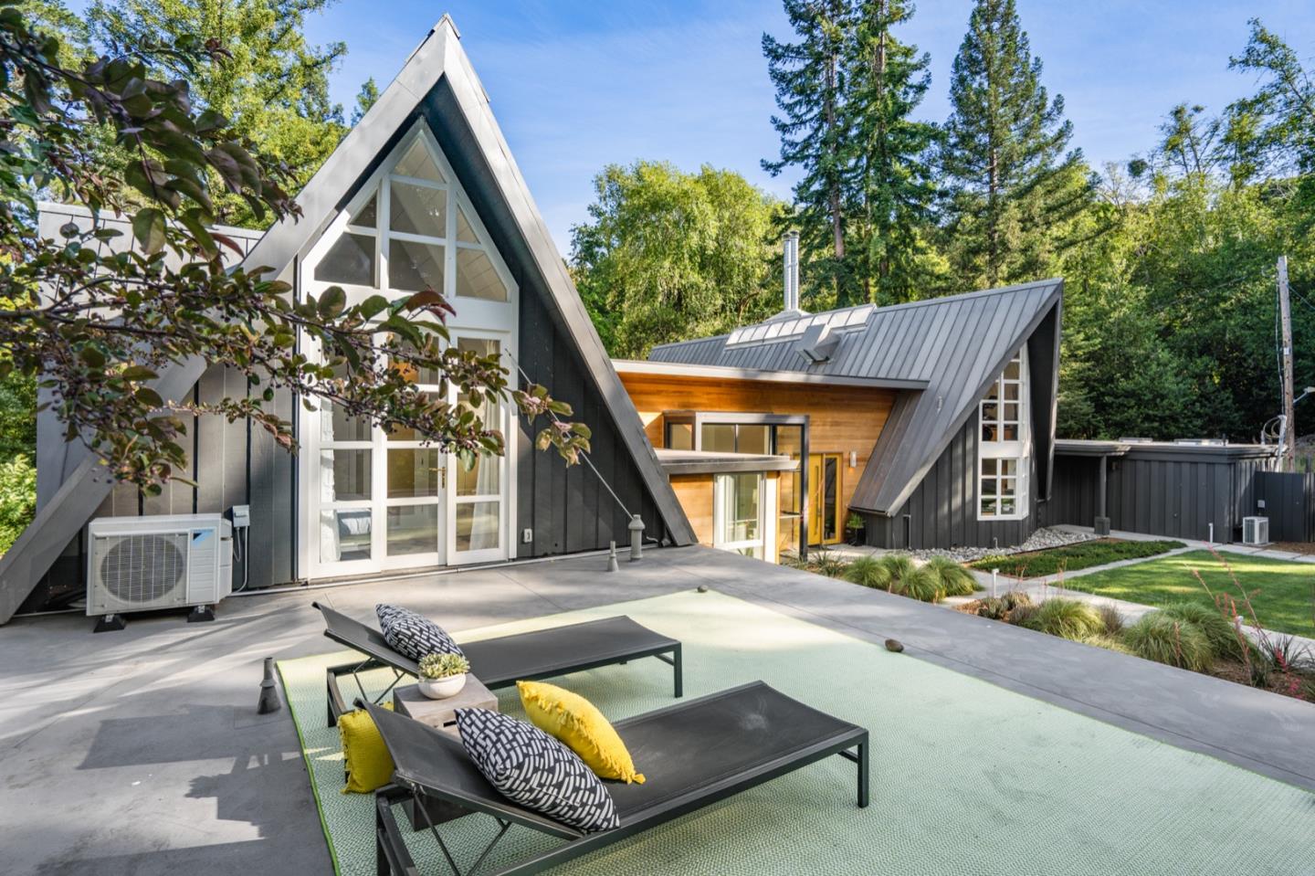 135 Willowbrook Drive Portola Valley, CA 94028 - Photo 41 of 50 a view of patio with a table and chairs and potted plants