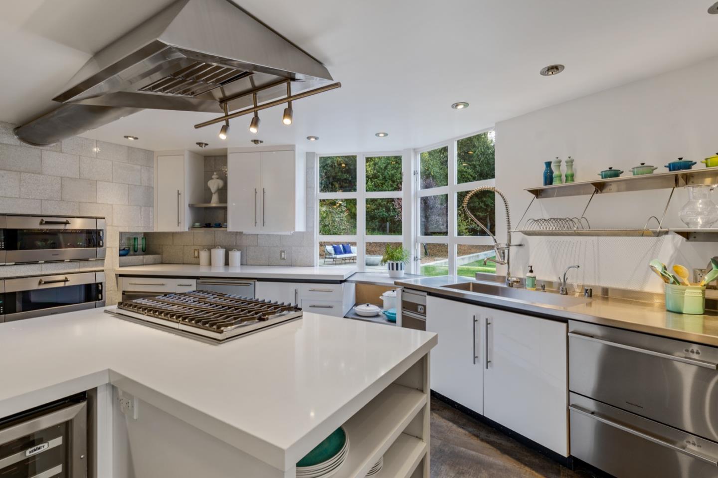 135 Willowbrook Drive Portola Valley, CA 94028 - Photo 49 of 50 a kitchen with a stove a sink and a refrigerator