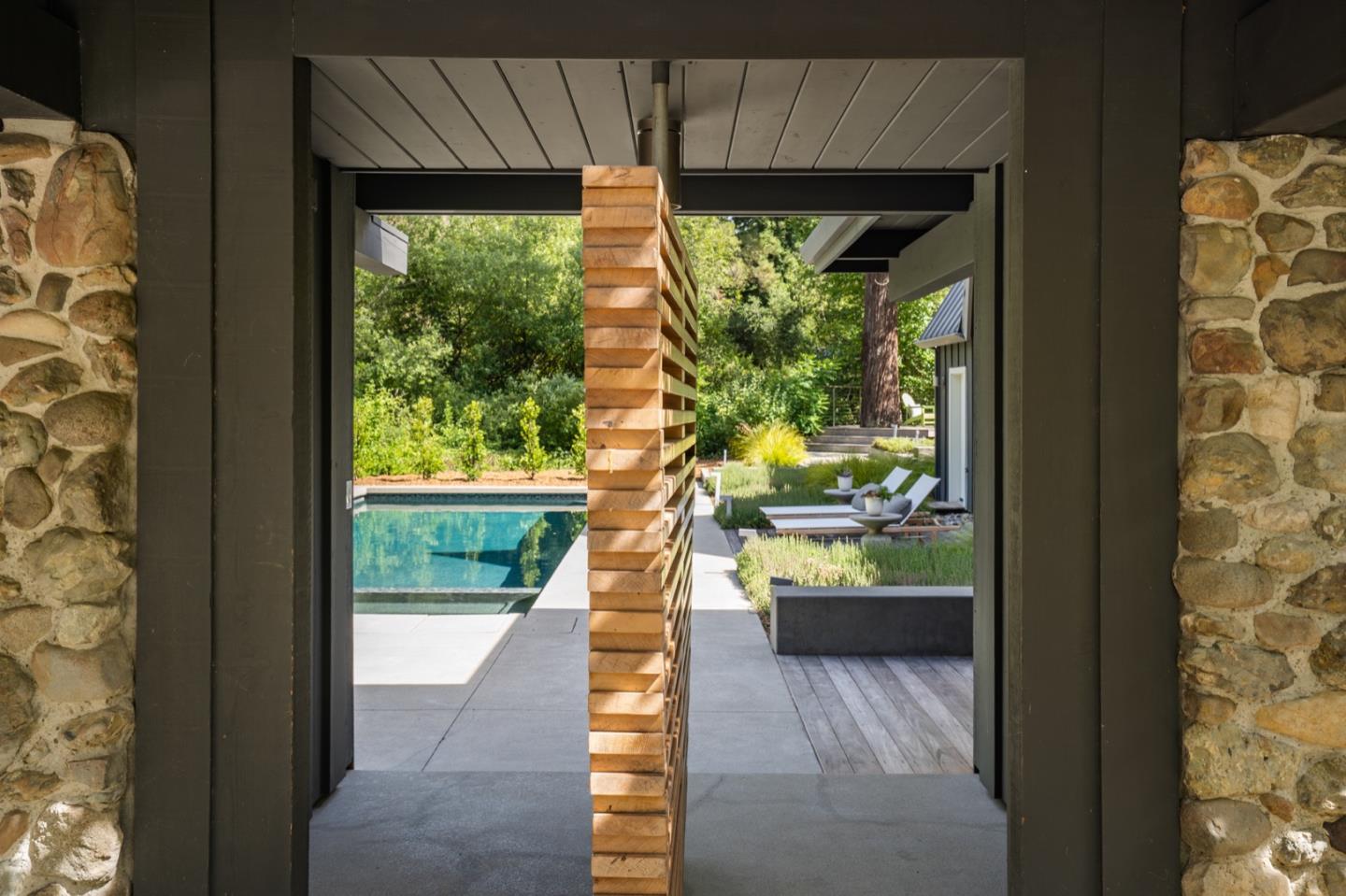135 Willowbrook Drive Portola Valley, CA 94028 - Photo 9 of 50 a view of a porch with wooden floor