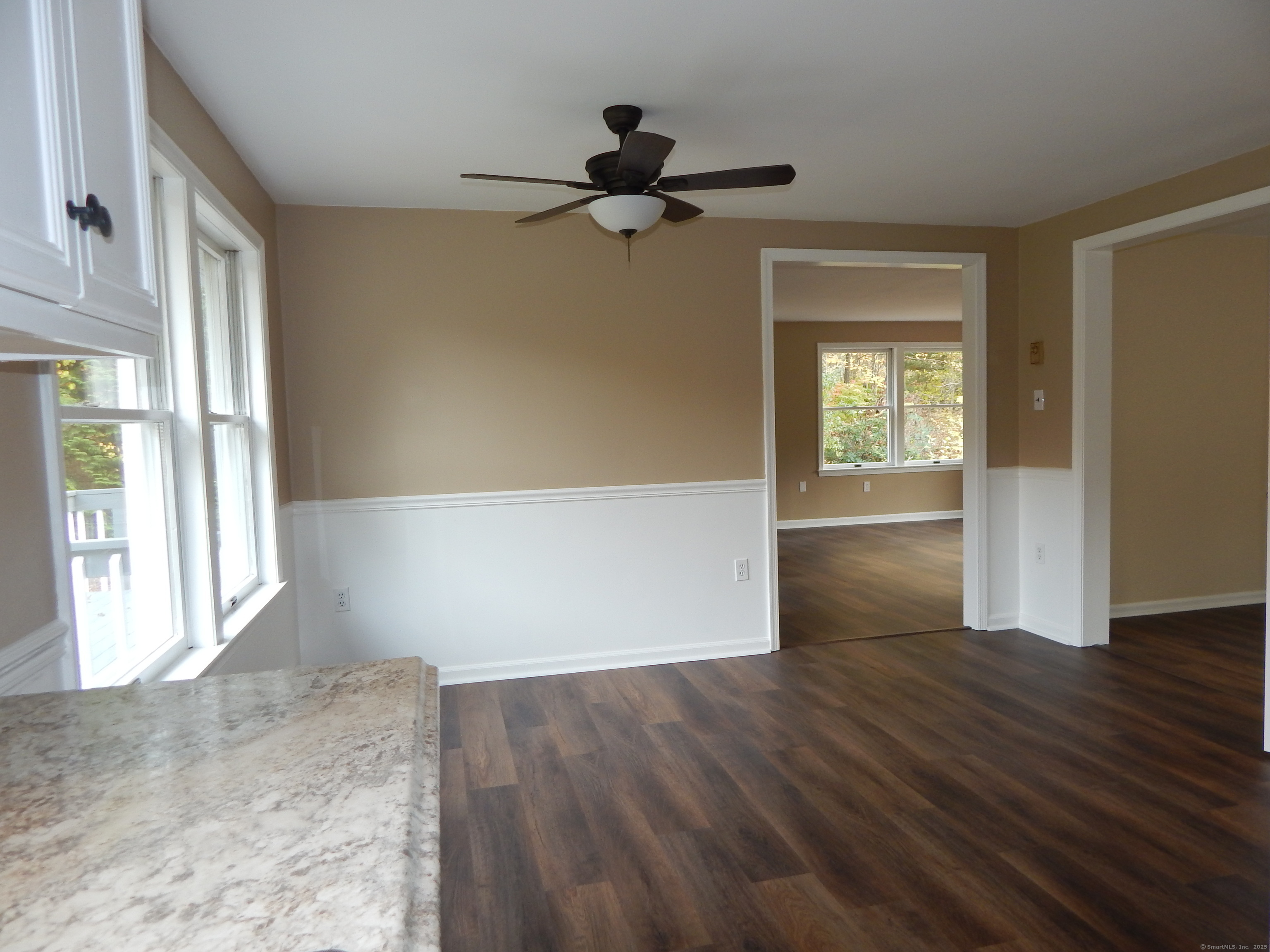 62 Bascom Road Lebanon, CT 06249 - Photo 12 of 34 wooden floor in an empty room with a window