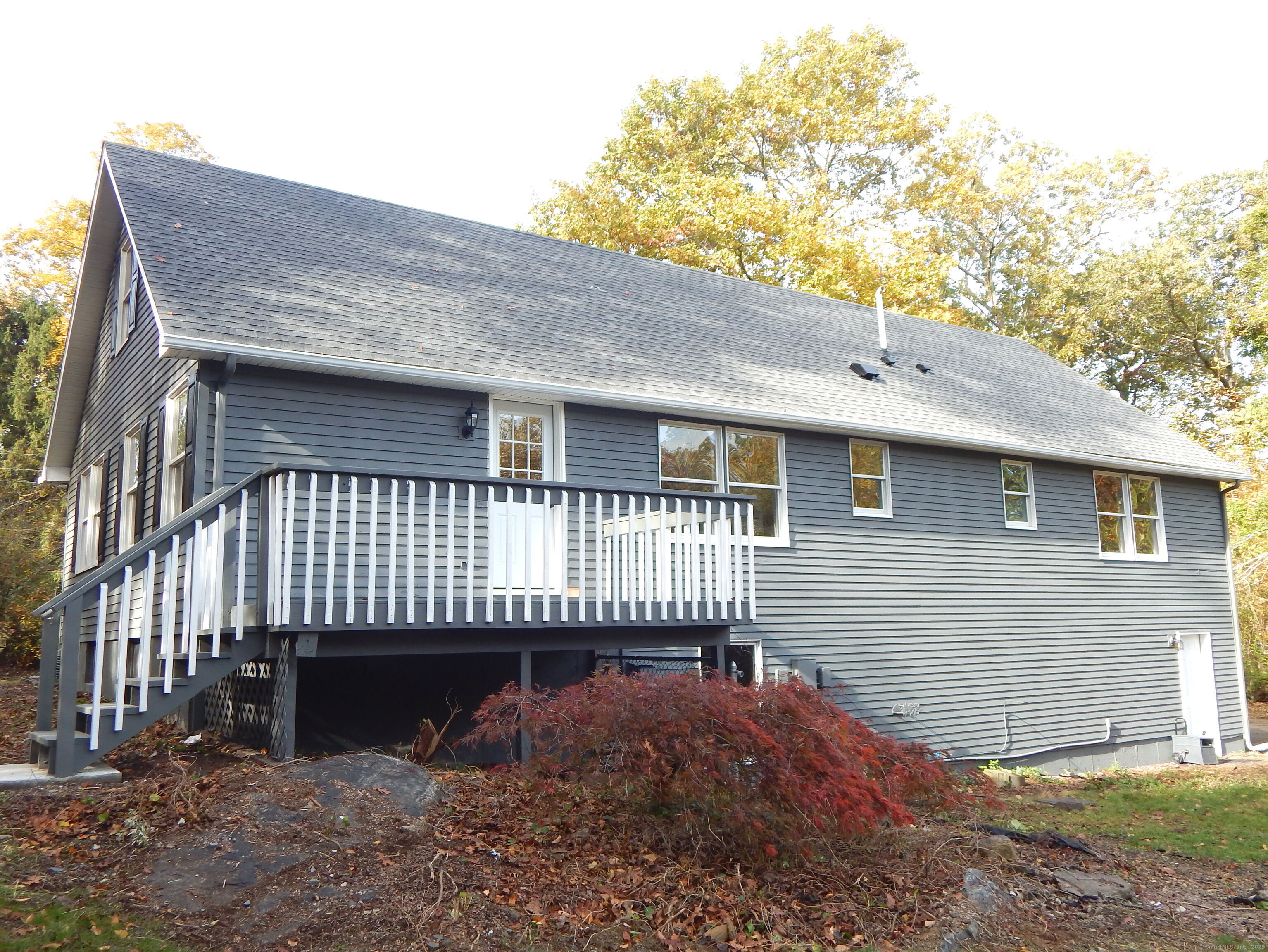 62 Bascom Road Lebanon, CT 06249 - Photo 2 of 34 a view of a house with a yard