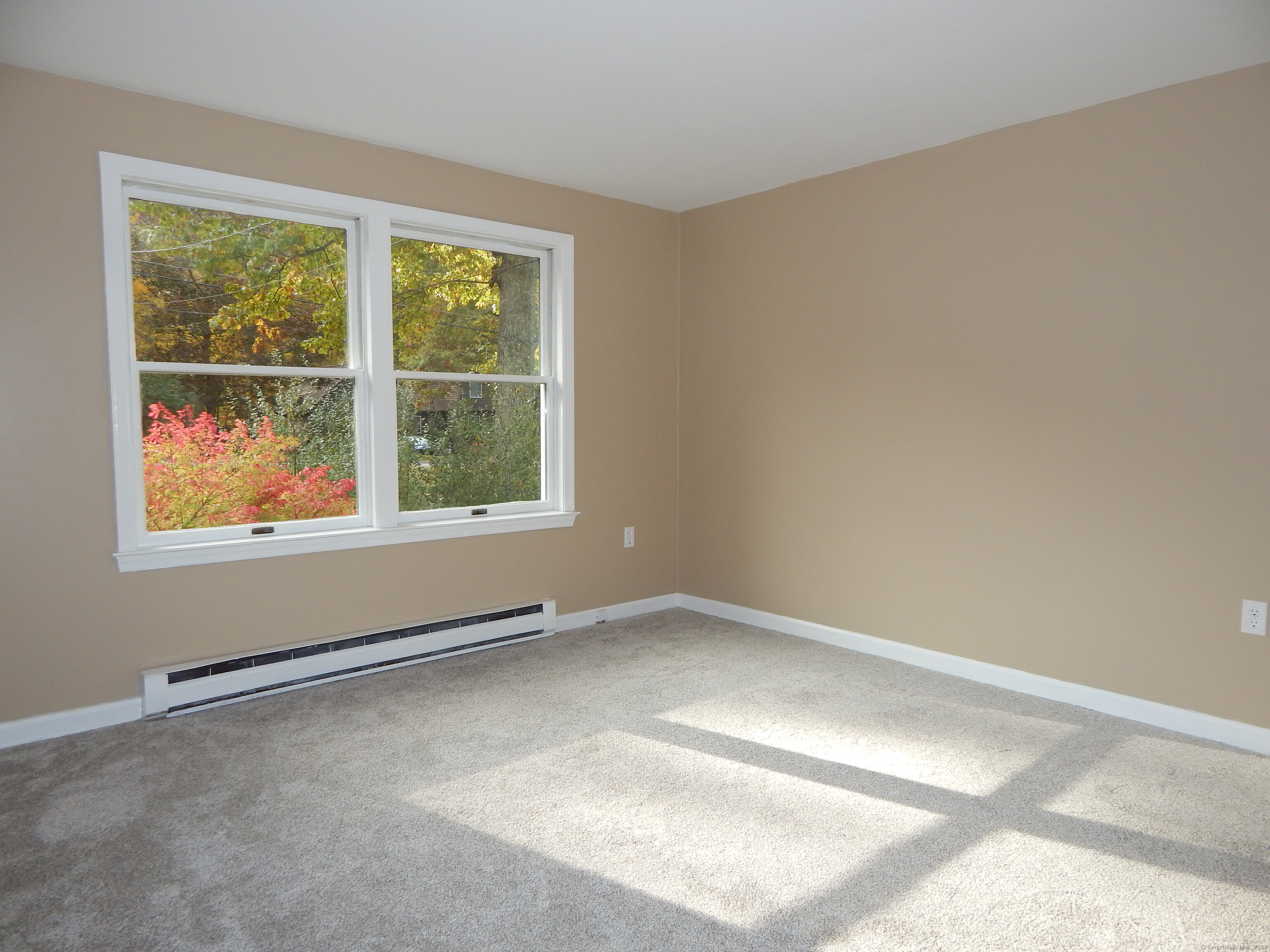 62 Bascom Road Lebanon, CT 06249 - Photo 25 of 34 an empty room with windows