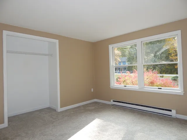 an empty room with windows