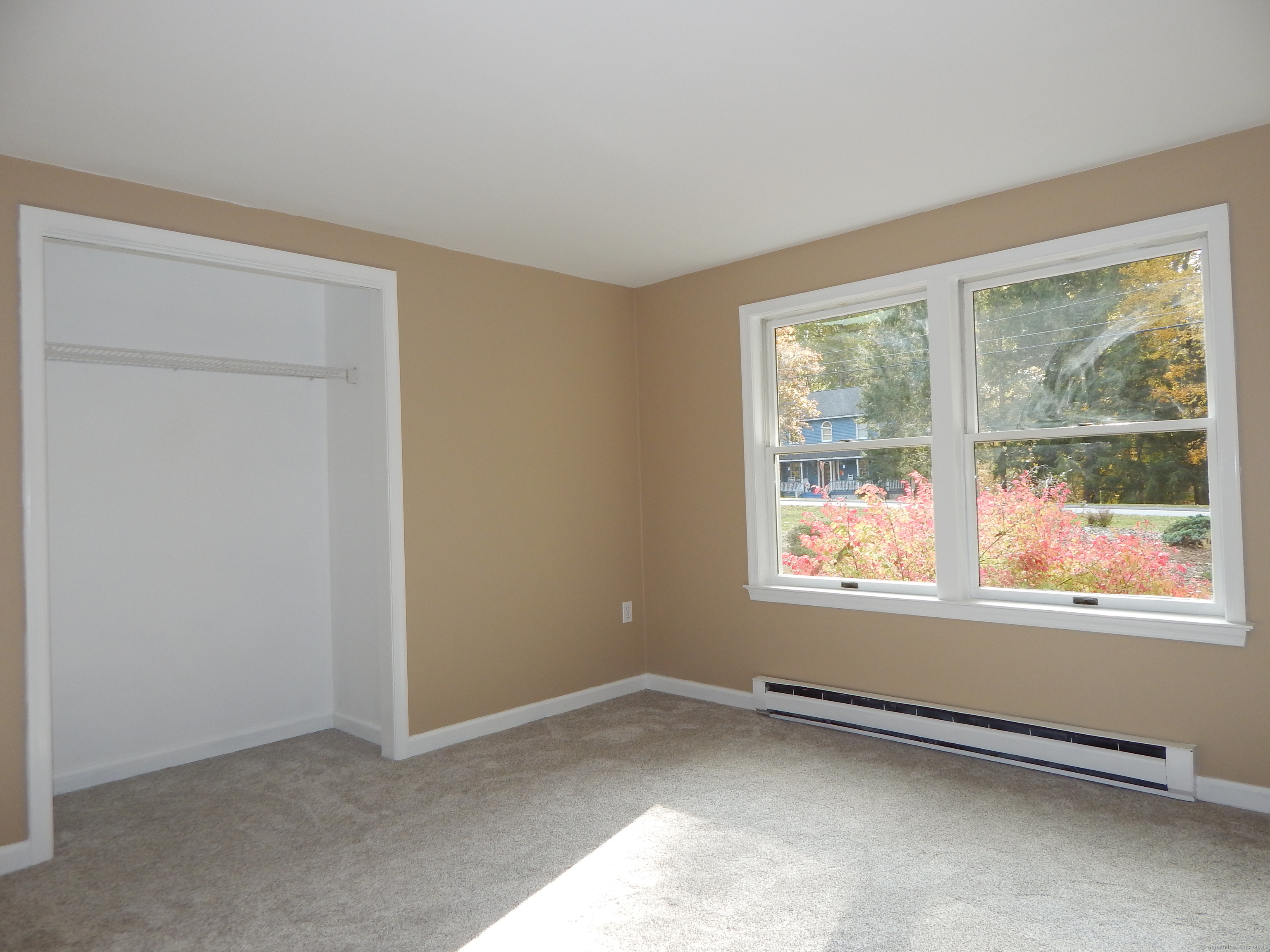 62 Bascom Road Lebanon, CT 06249 - Photo 26 of 34 an empty room with windows