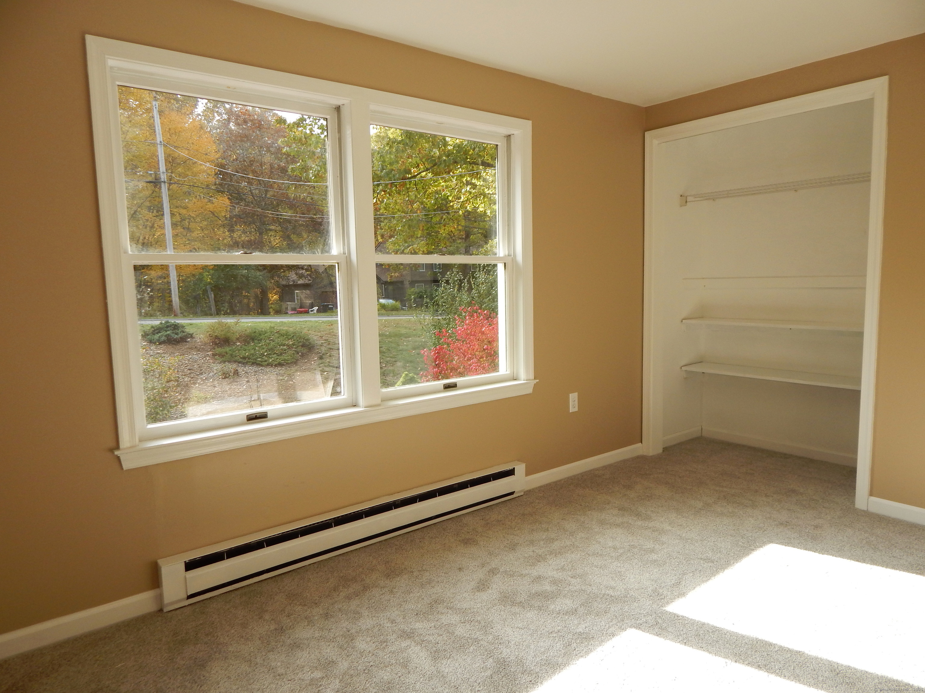 62 Bascom Road Lebanon, CT 06249 - Photo 28 of 34 an empty room with windows