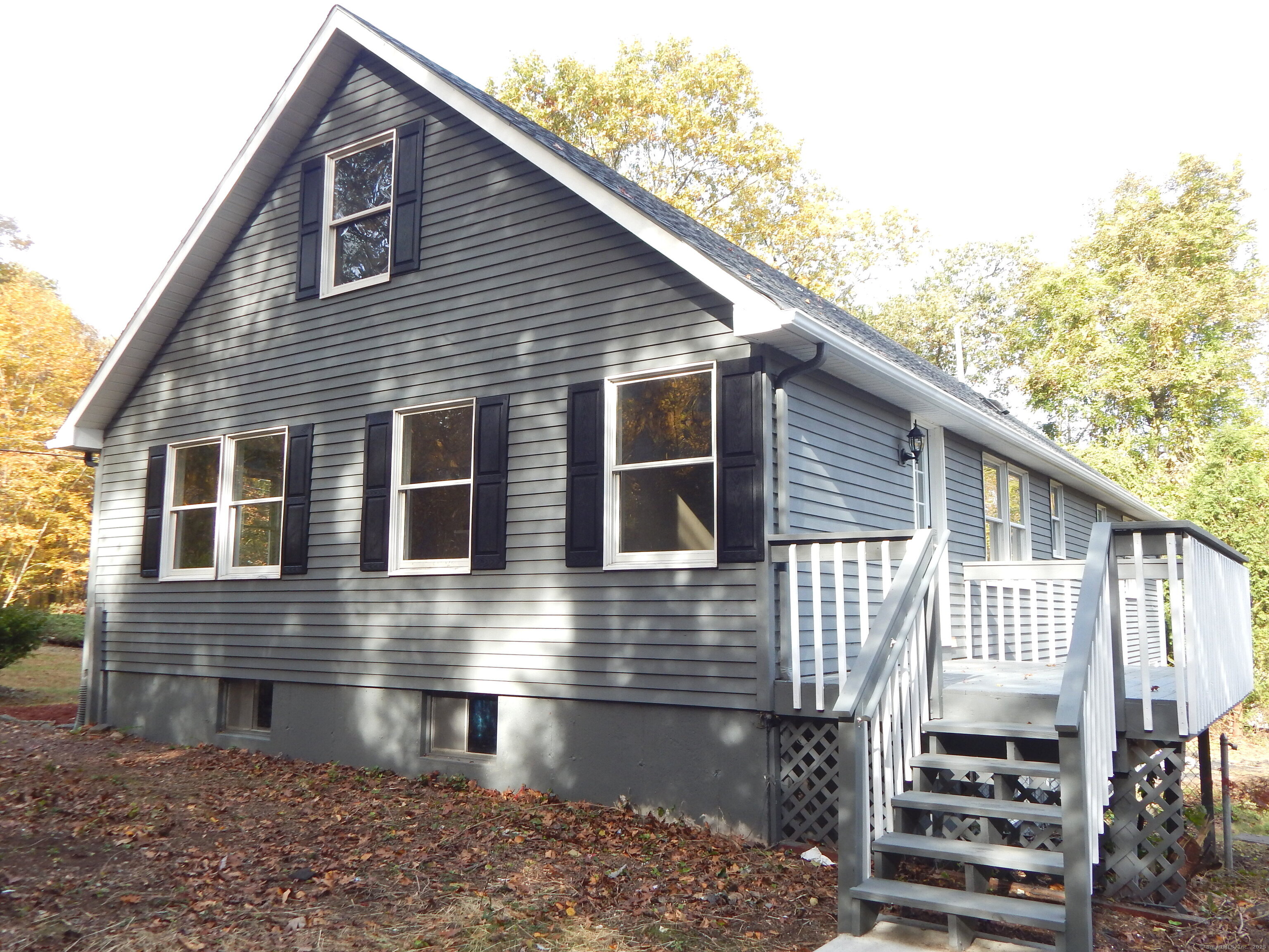 62 Bascom Road Lebanon, CT 06249 - Photo 3 of 34 a front view of a house with balcony