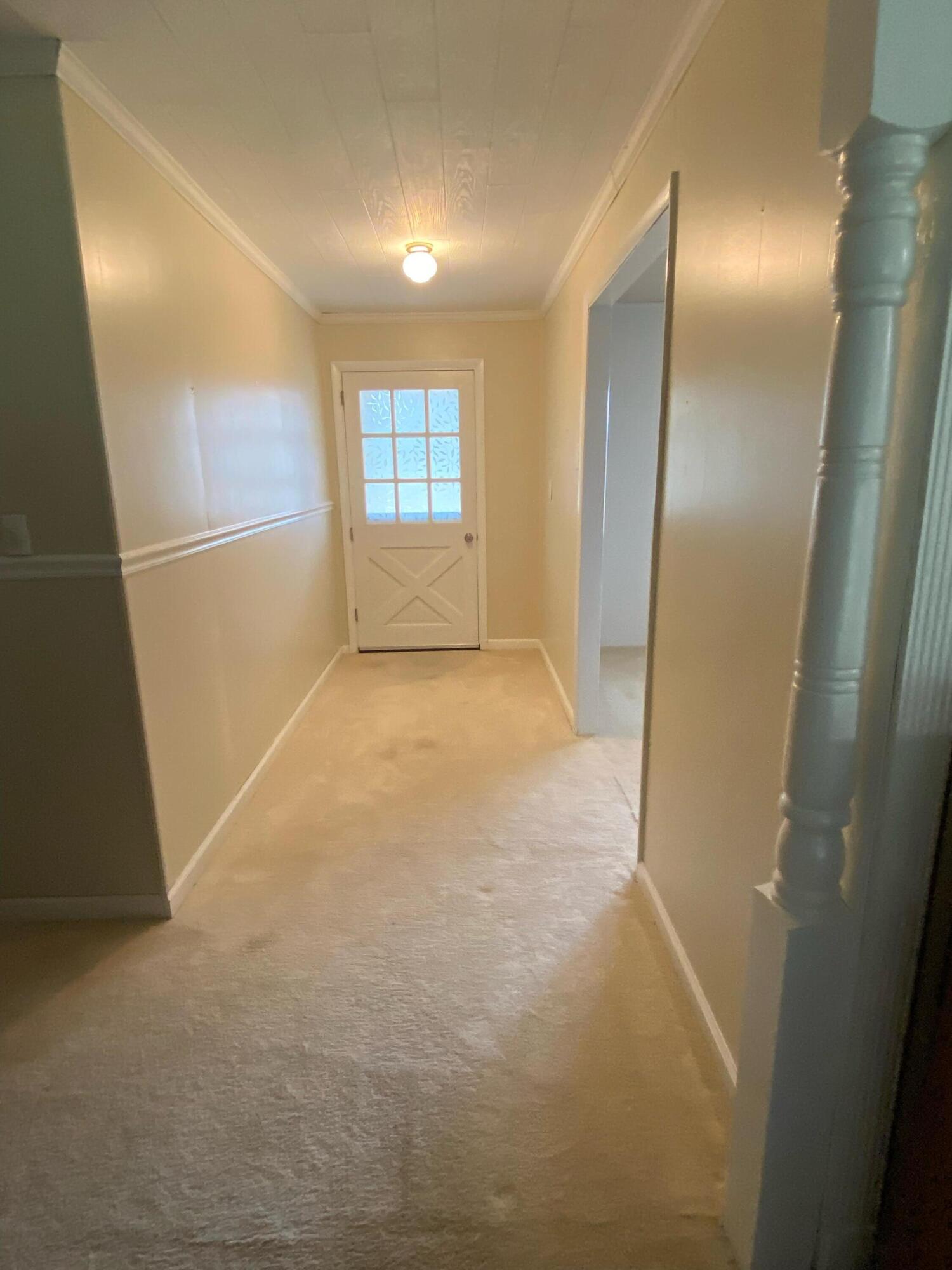 186 McLaughlin Road Milton, FL 32570 - Photo 17 of 26 a view of hallway with window