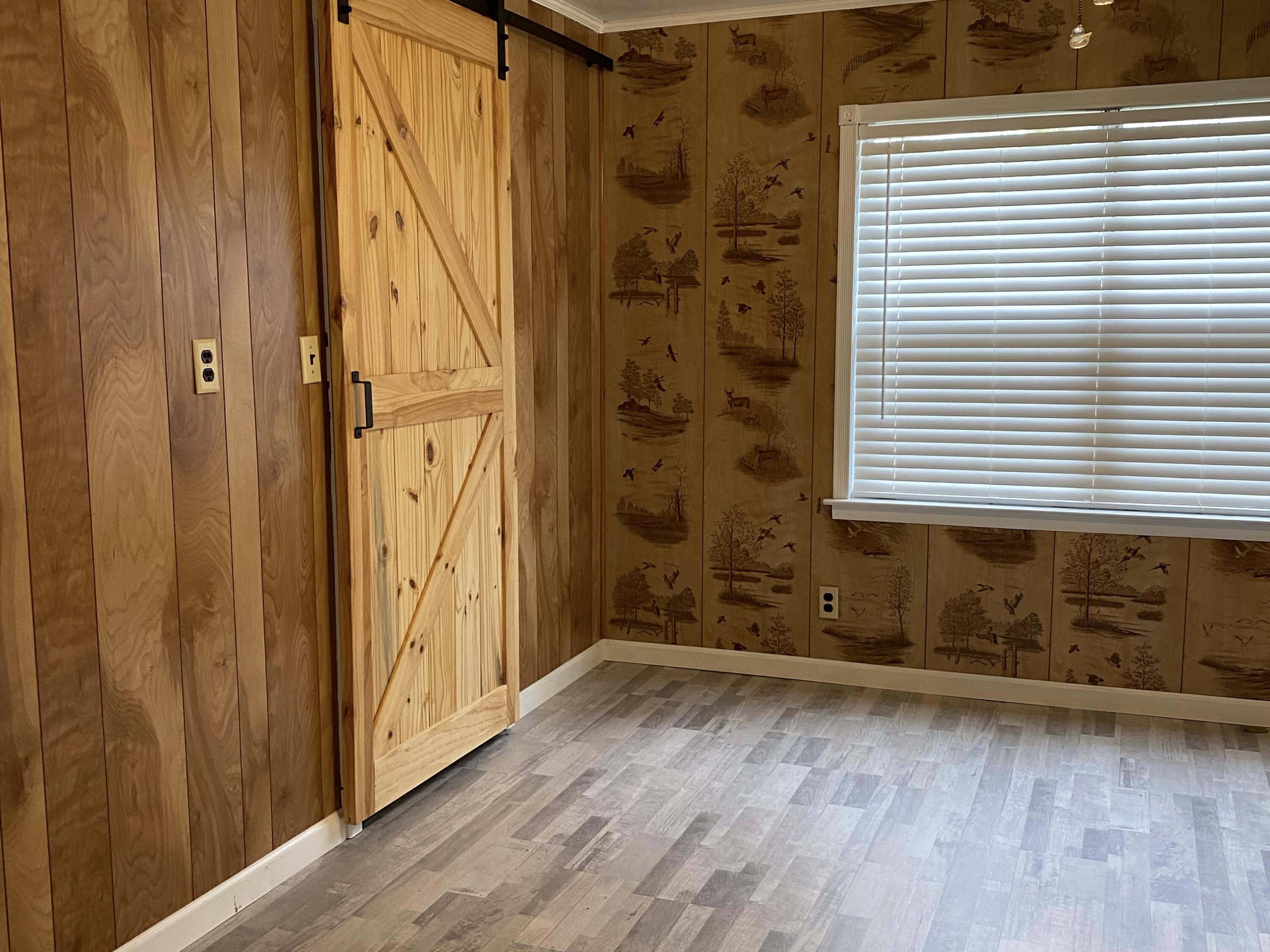 186 McLaughlin Road Milton, FL 32570 - Photo 8 of 26 a bathroom with a tub and shower