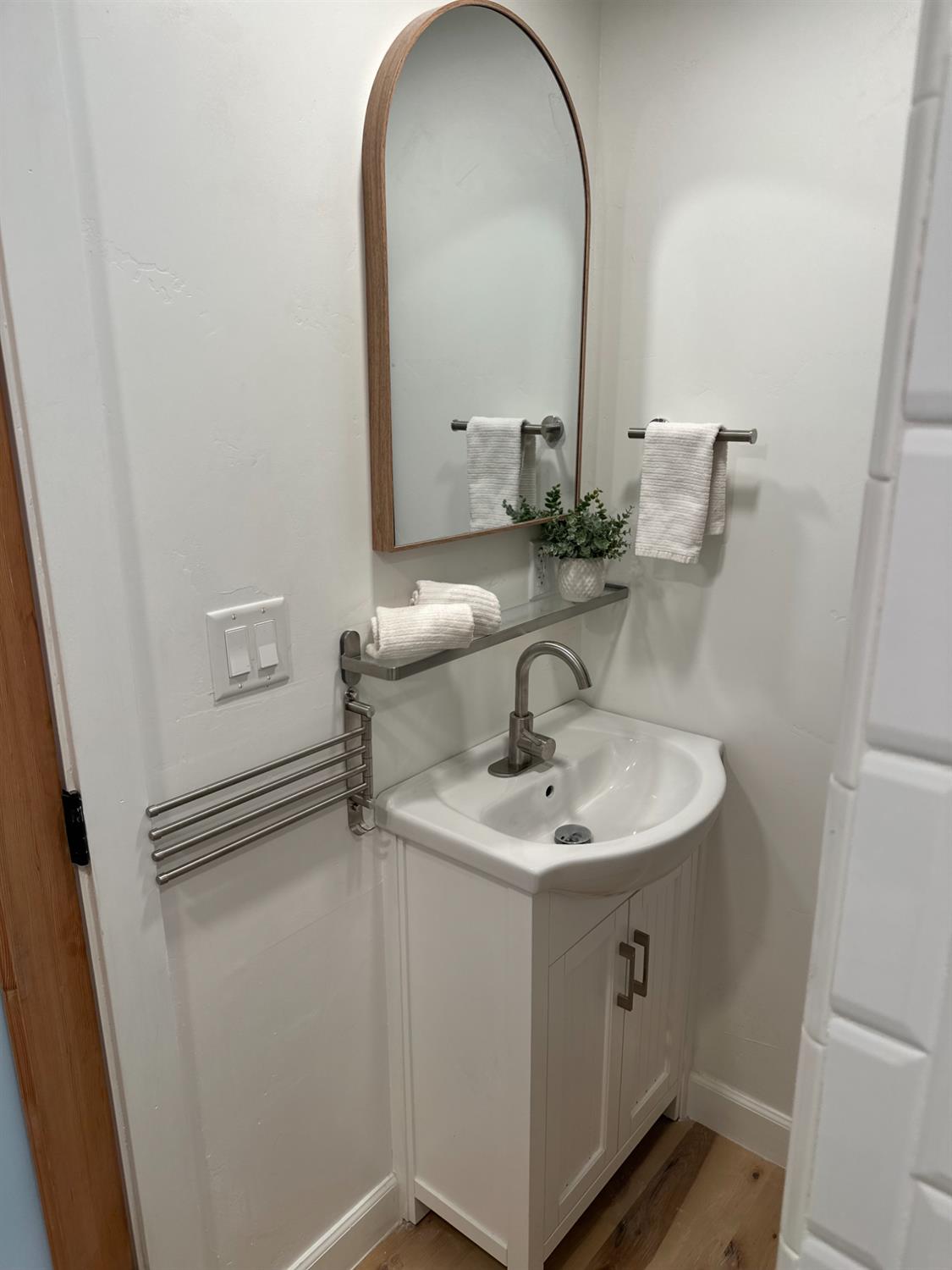 225 North Akers Road, Unit 308 Visalia, CA 93291 - Photo 17 of 72 a bathroom with a sink and a mirror