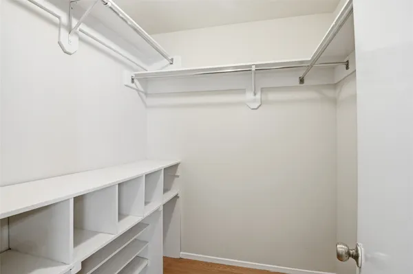 a view of an empty walk in closet