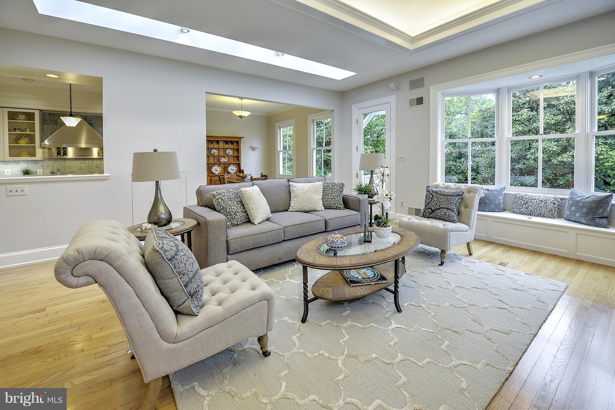 6305 Broad Branch Road Chevy Chase, MD 20815 - Photo 8 of 30 Family Room connects to kitchen with views of back