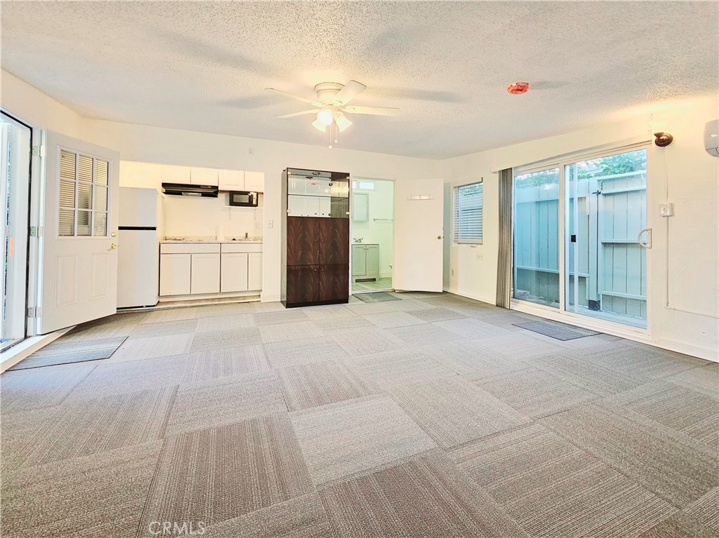 7513 Lurline Avenue Winnetka, CA 91306 - Photo 5 of 9 a view of empty room with kitchen