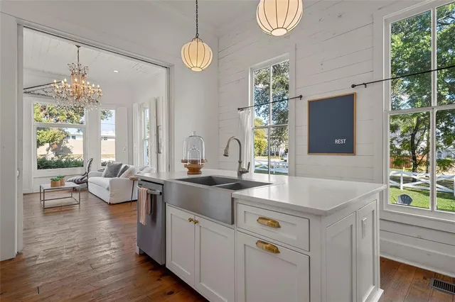 a white bath tub sitting in a bathroom