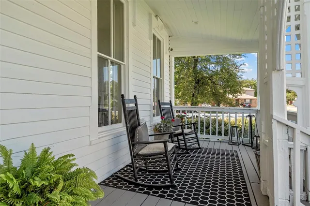 a view of livingroom with furniture and floor to ceiling window