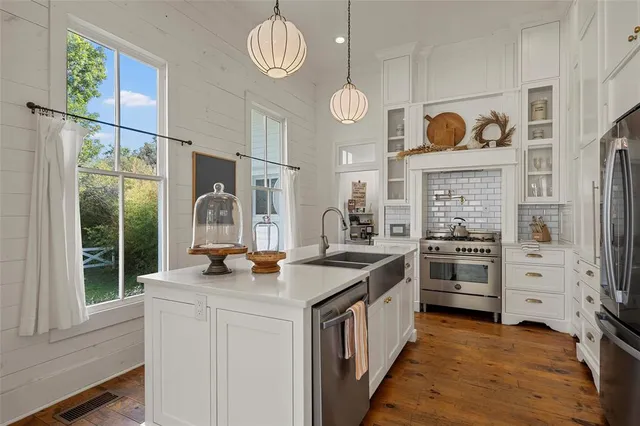 a bedroom with a bed and a television