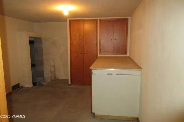 a room with storage and utility