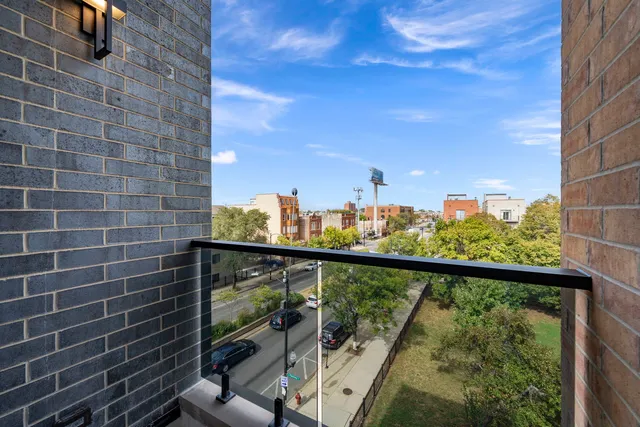 a view of a balcony with an outdoor space