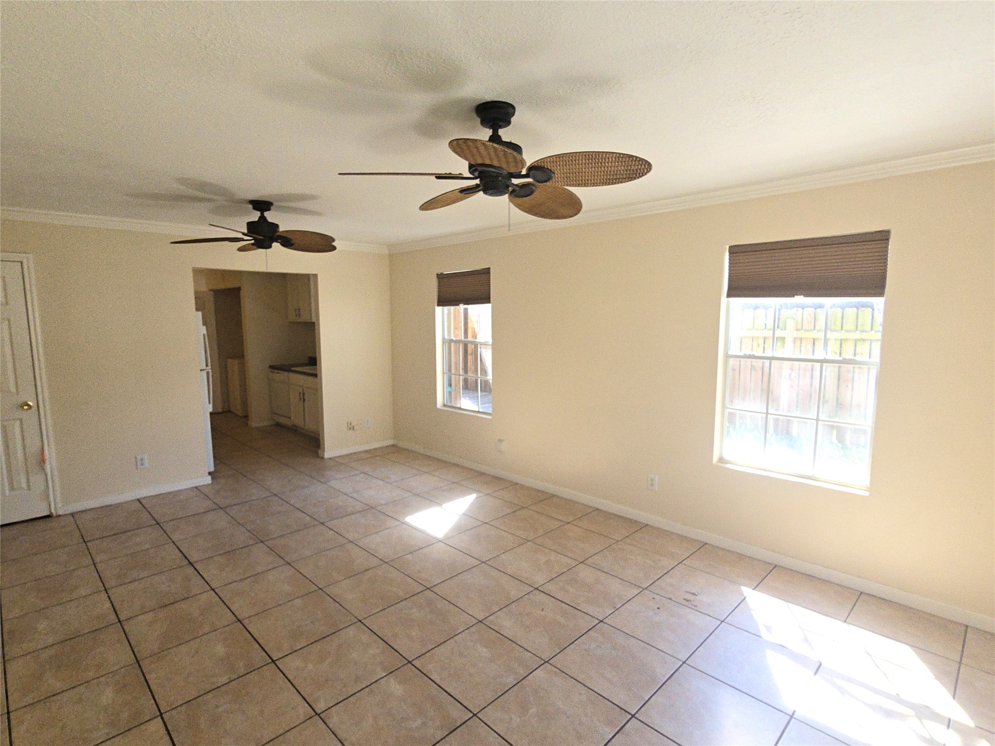 409 Commerce Street Tomball, TX 77375 - Photo 4 of 25 a view of an empty room and window