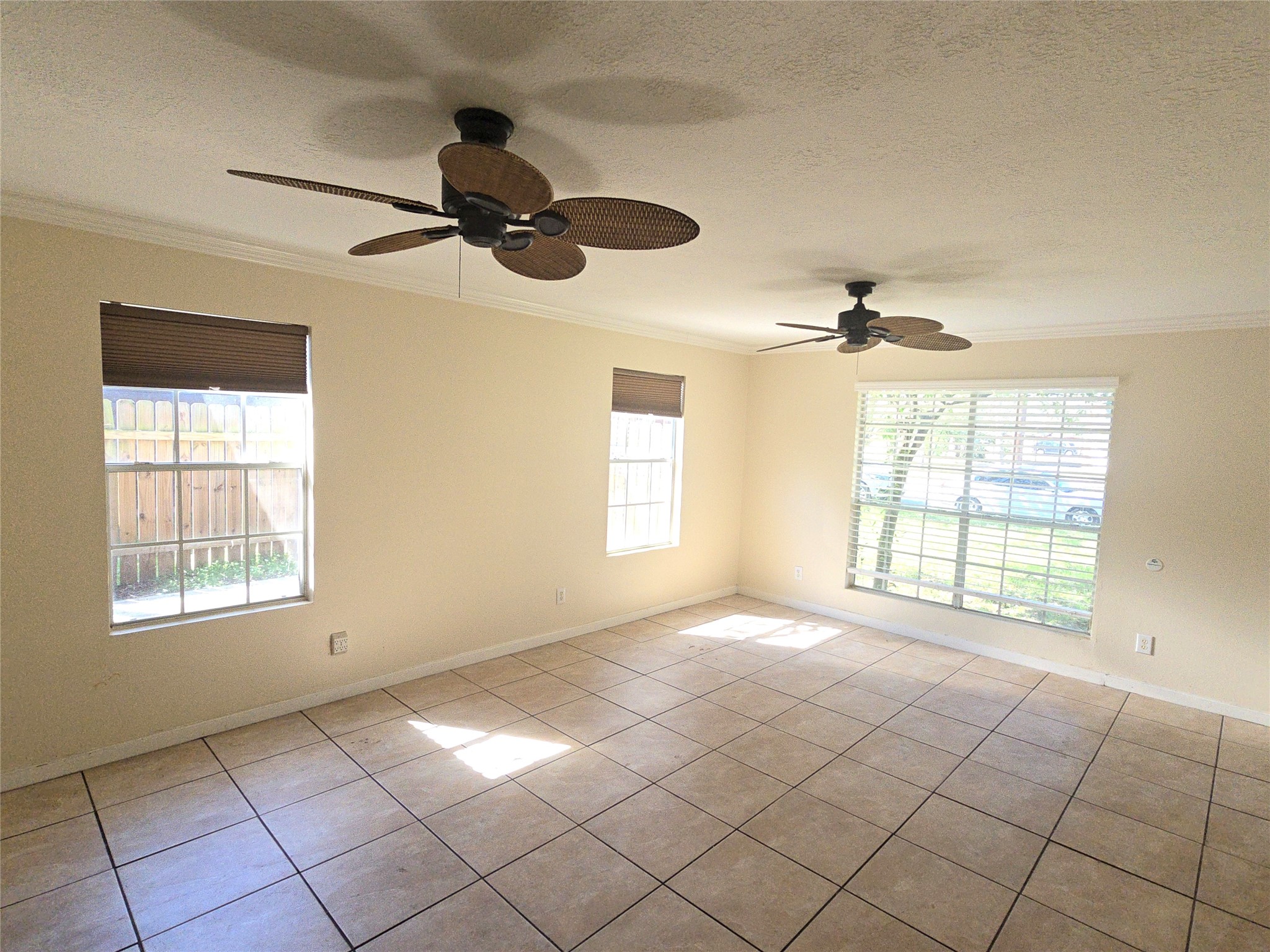 409 Commerce Street Tomball, TX 77375 - Photo 6 of 25 a view of an empty room and window