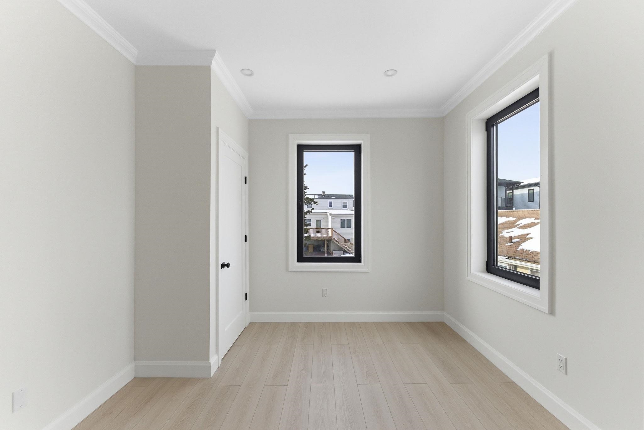 703 3rd Street Secaucus, NJ 07094 - Photo 17 of 49 an empty room with a window