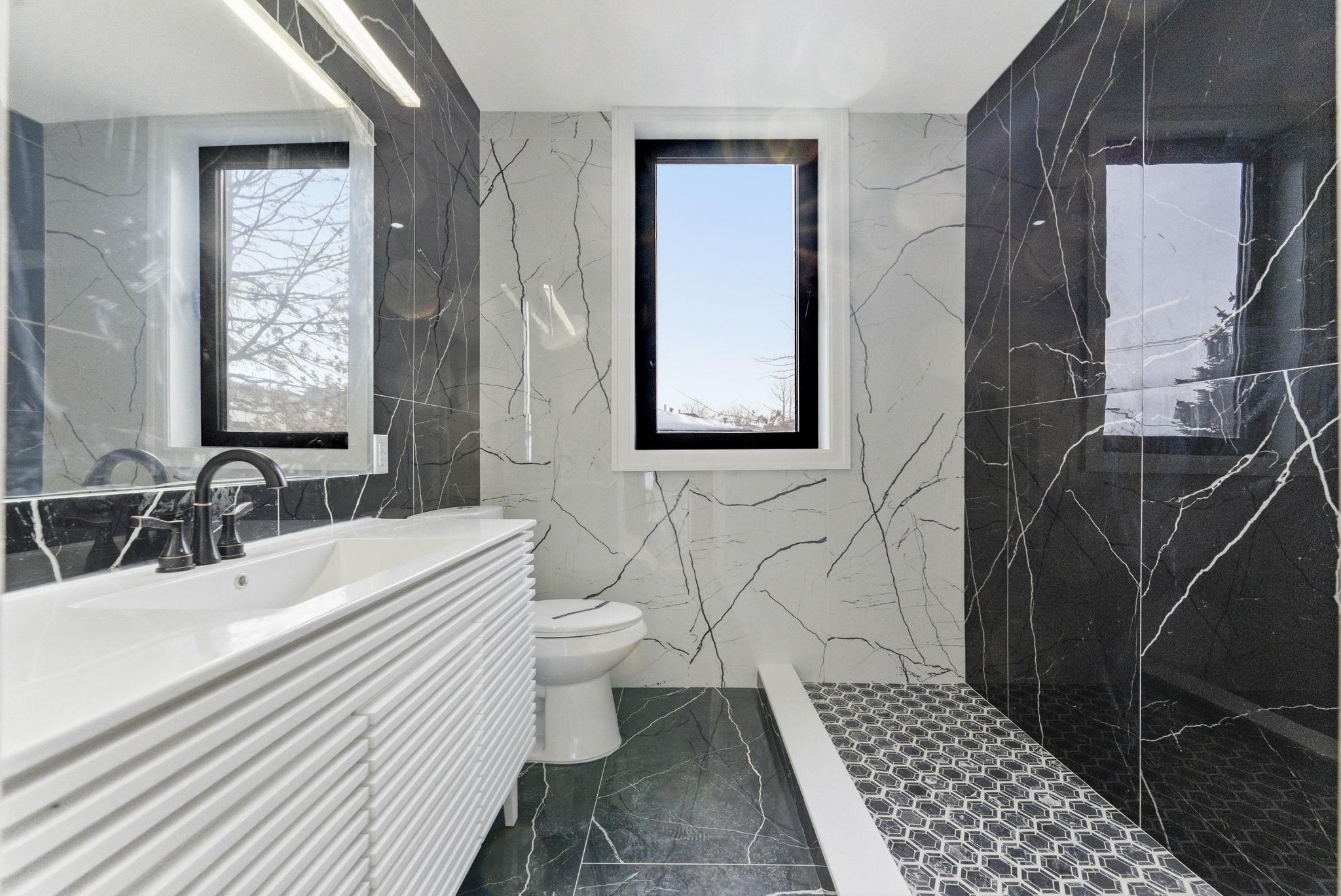 703 3rd Street Secaucus, NJ 07094 - Photo 19 of 49 a bathroom with a sink toilet and shower