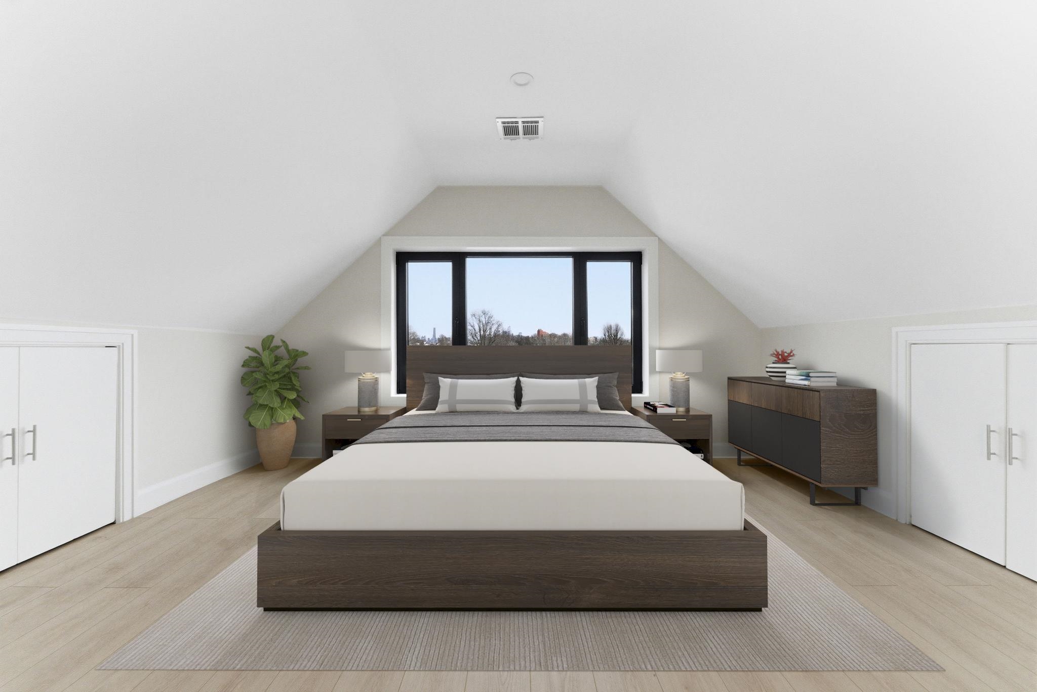 703 3rd Street Secaucus, NJ 07094 - Photo 29 of 49 a spacious bedroom with a bed and a window