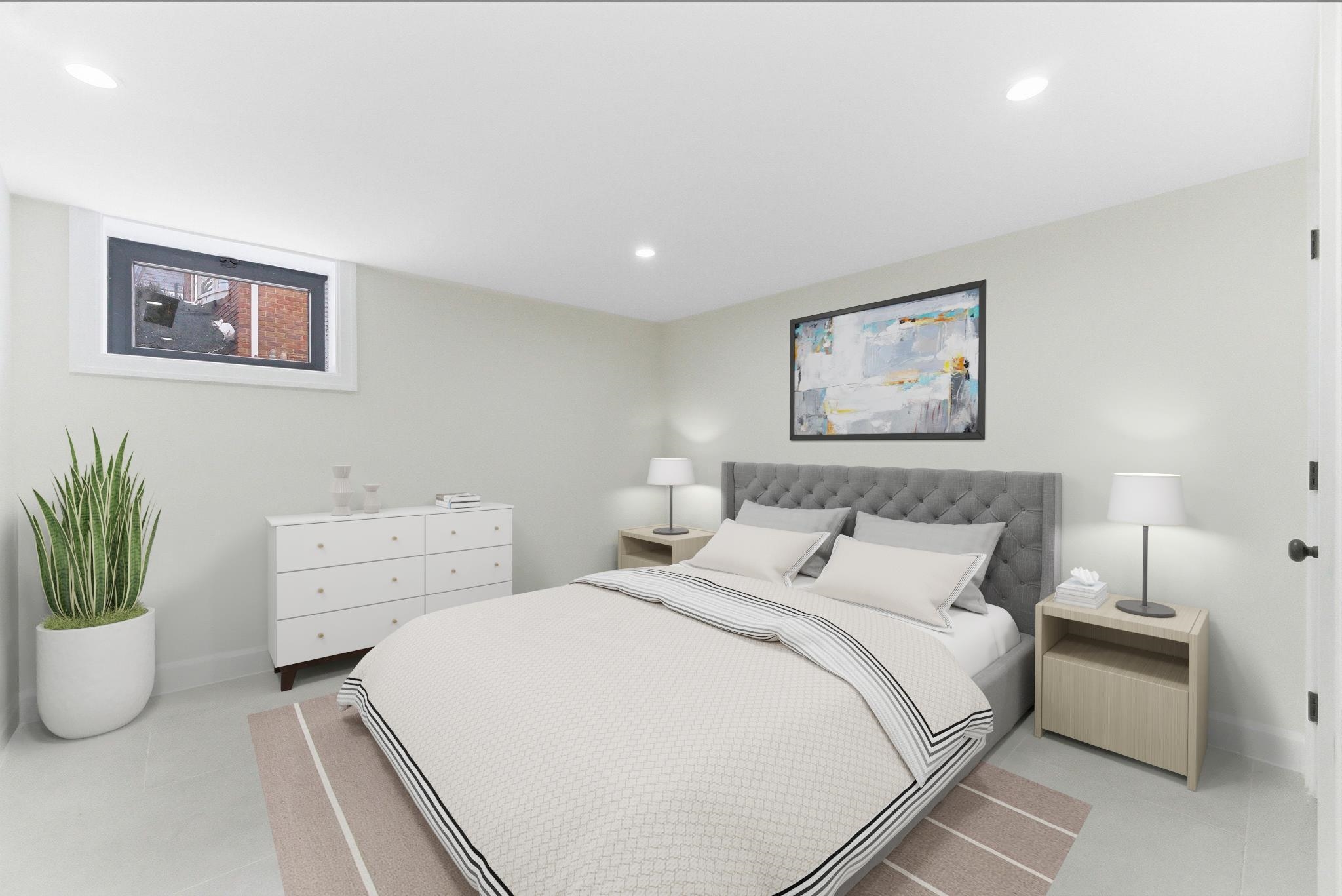 703 3rd Street Secaucus, NJ 07094 - Photo 32 of 49 a bedroom with a bed and a couch
