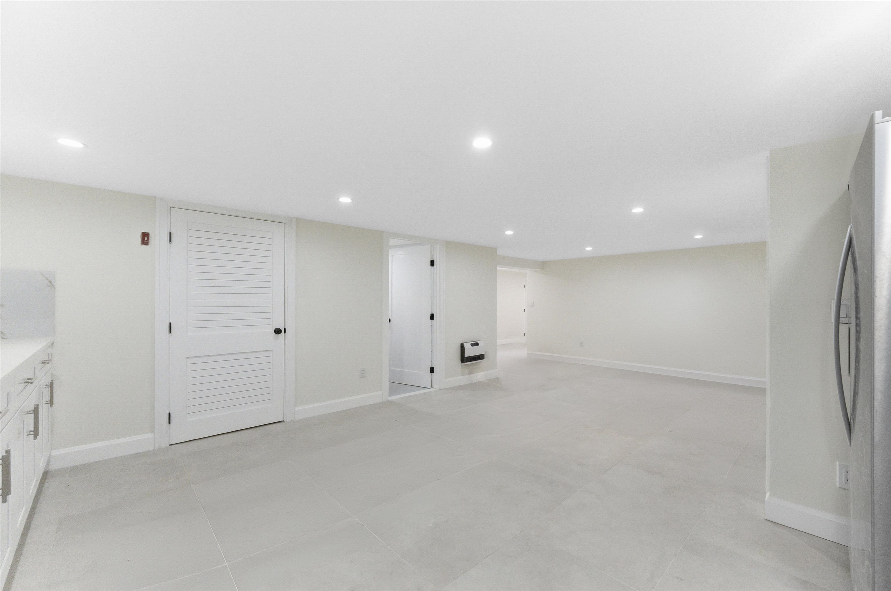 703 3rd Street Secaucus, NJ 07094 - Photo 34 of 49 an empty room with closet and mirror