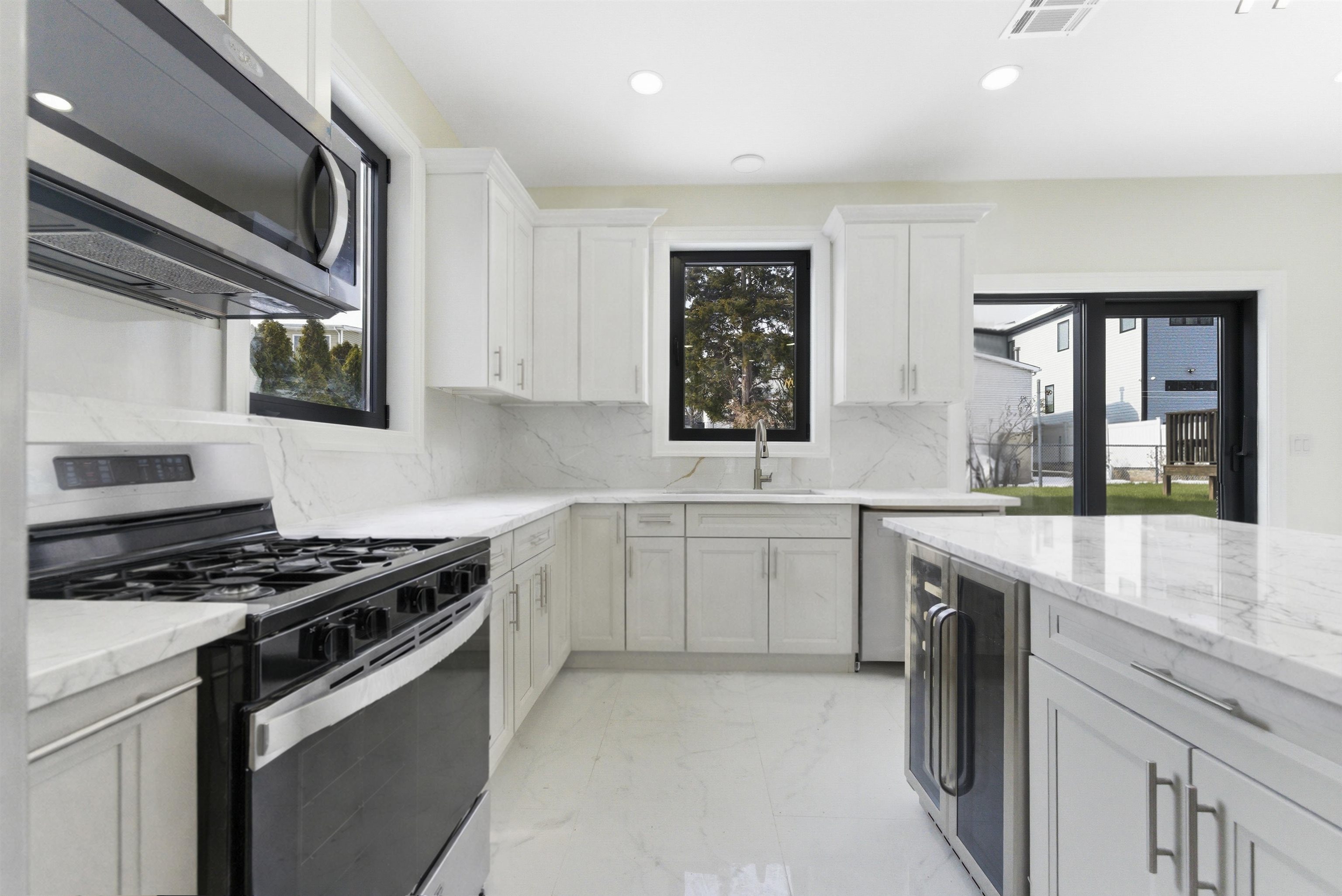 703 3rd Street Secaucus, NJ 07094 - Photo 8 of 49 a kitchen that has a sink and a stove
