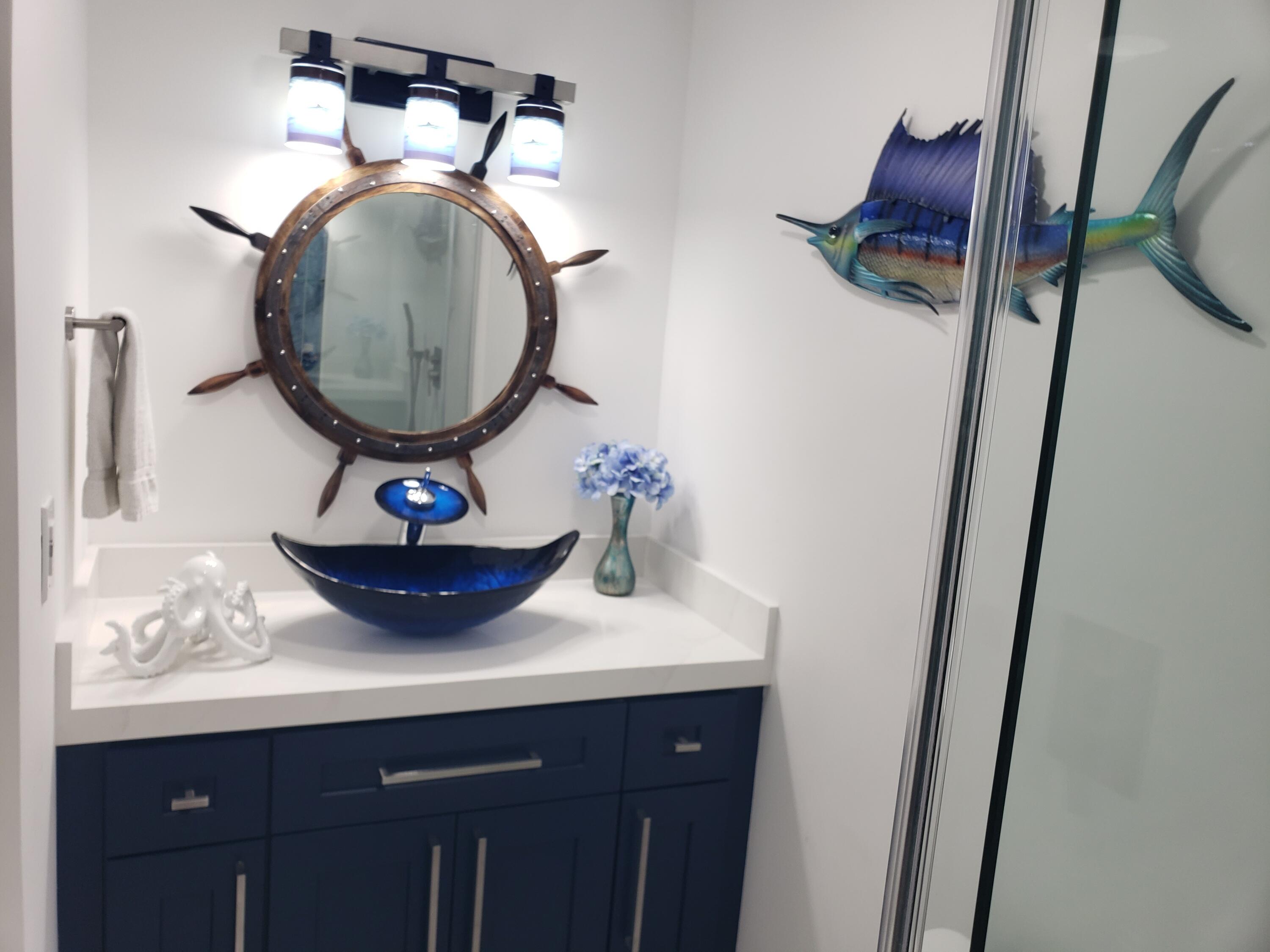 3520 South Ocean Boulevard, Unit H502 South Palm Beach, FL 33480 - Photo 19 of 35 a bathroom with a sink and a mirror