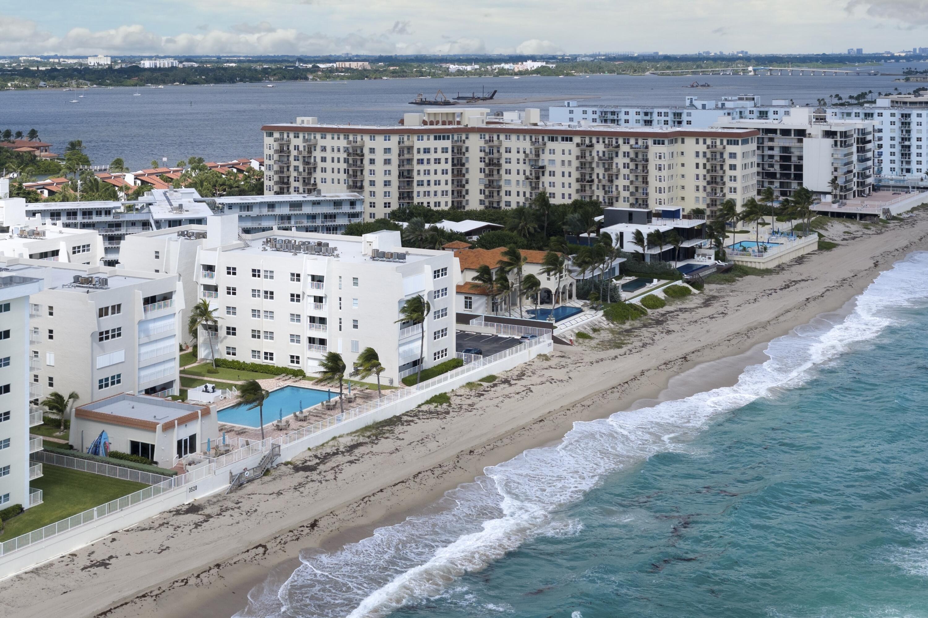 3520 South Ocean Boulevard, Unit H502 South Palm Beach, FL 33480 - Photo 26 of 35 a view of a lake with outdoor space
