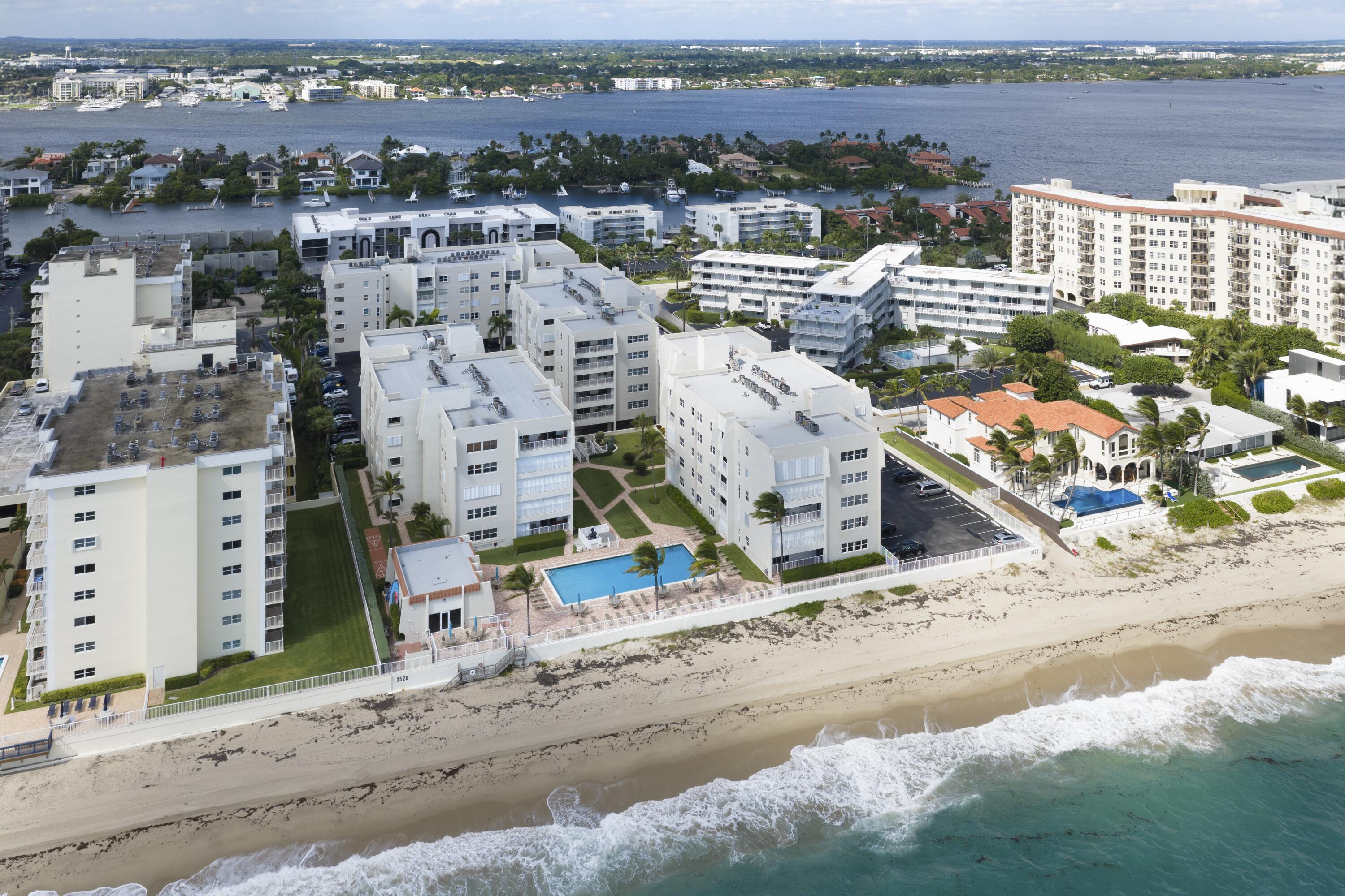 3520 South Ocean Boulevard, Unit H502 South Palm Beach, FL 33480 - Photo 28 of 35 an aerial view of residential houses with outdoor space