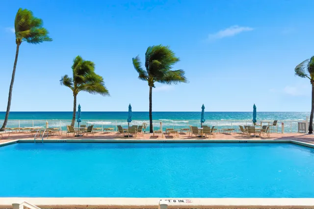 a vase of flowers sitting on a table