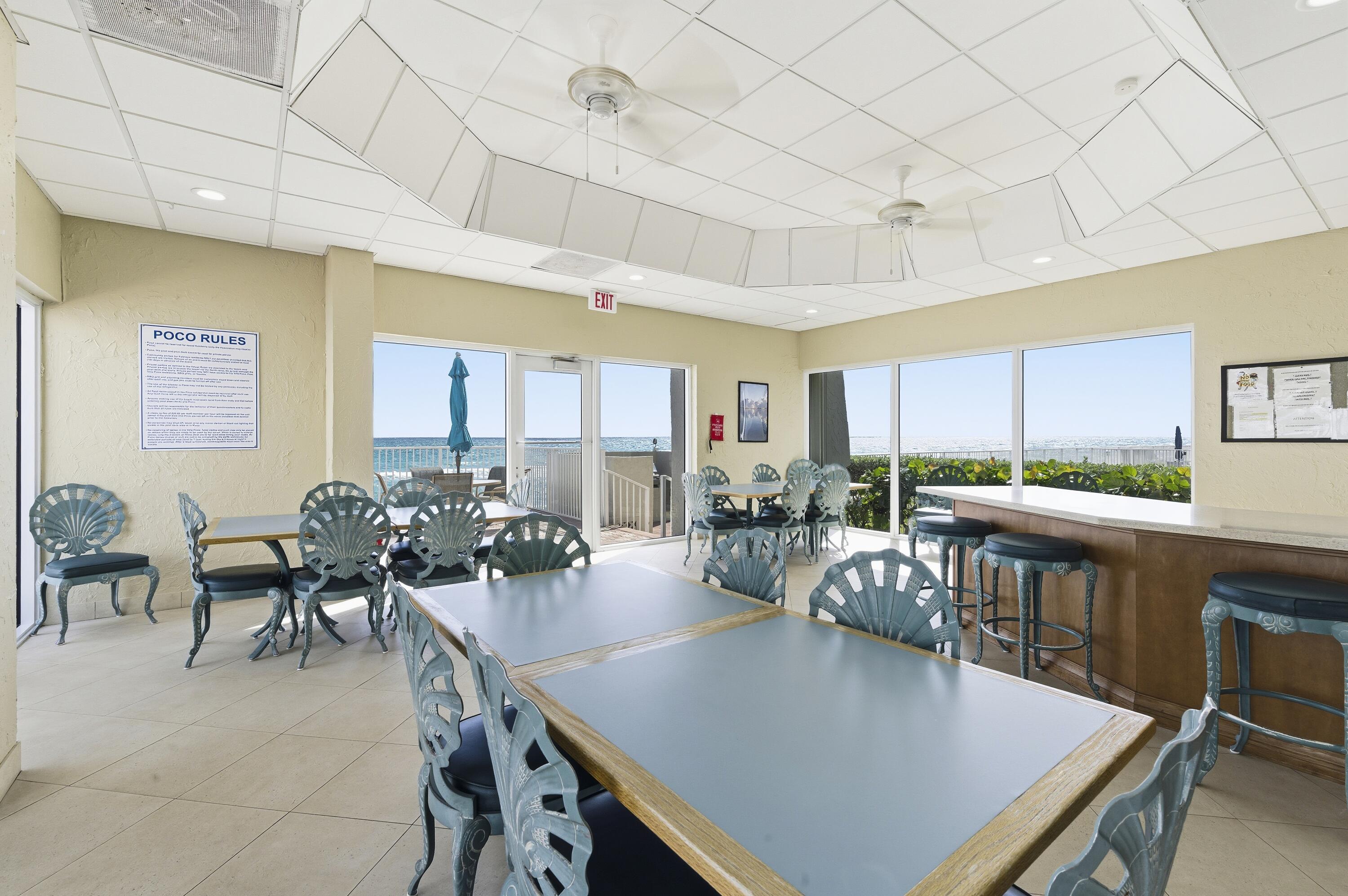 3520 South Ocean Boulevard, Unit H502 South Palm Beach, FL 33480 - Photo 32 of 35 a view of a dining room with furniture window and outside view