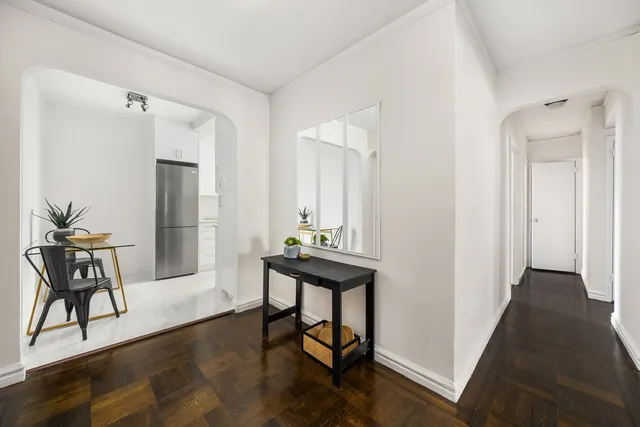 a view of a livingroom with furniture and wooden floor